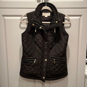 Michael Kors dark brown PS vest In excellent condition, it has 4 zipped pockets